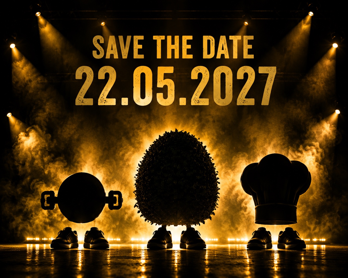 Save the Date 22.05.2027 – drei Figuren im goldenen Bühnenlicht